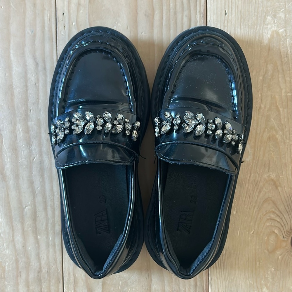 Black loafers with crystal top